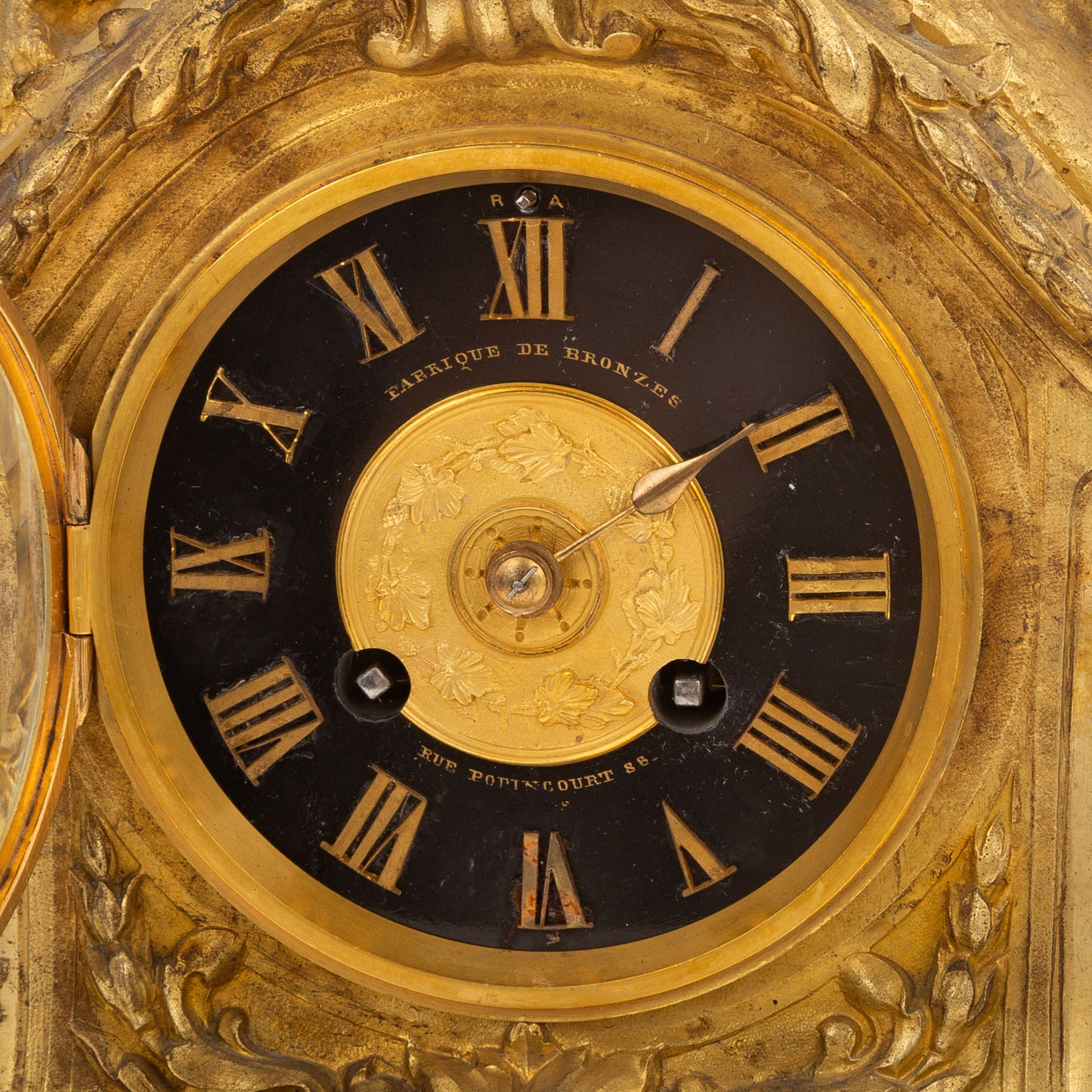A French Gilt Bronze Figural Mantel Clock
