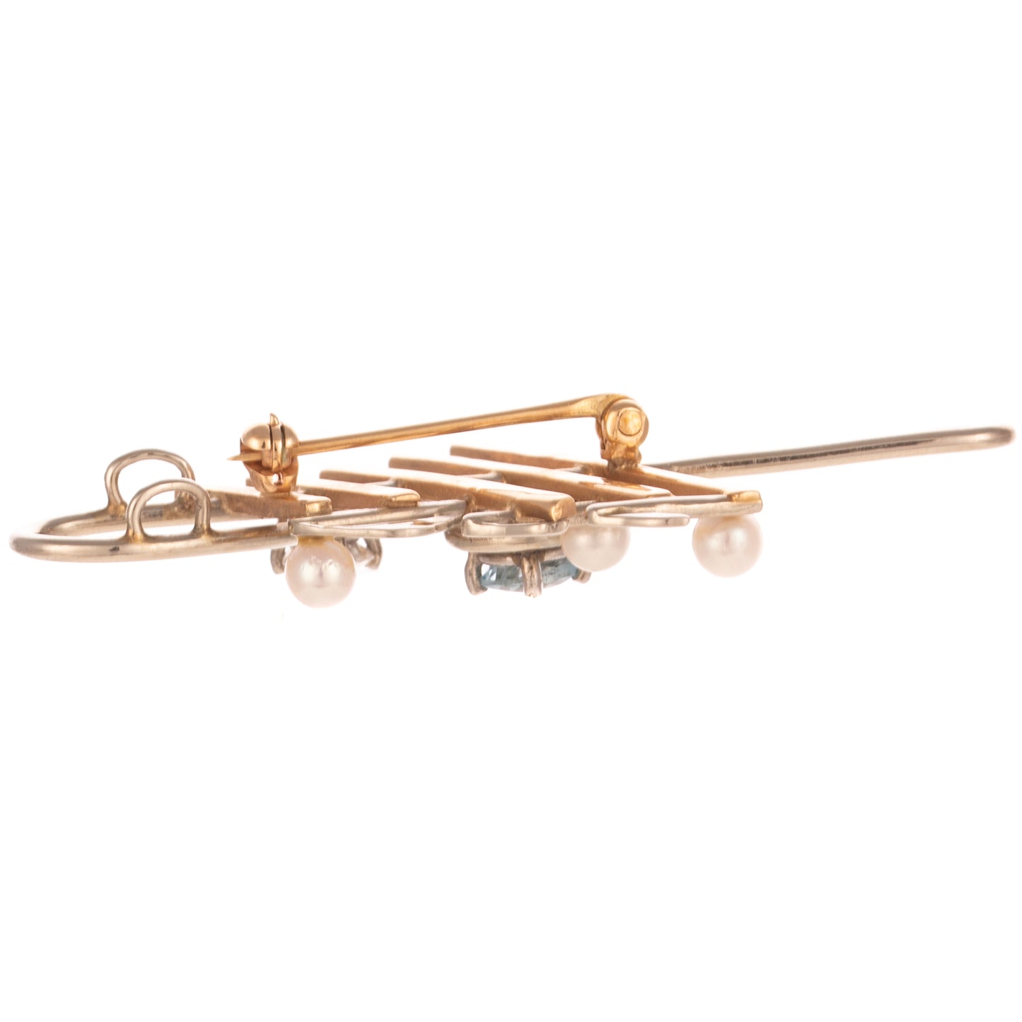 A Diamond & Aquamarine Treble Cleft Brooch in 14K