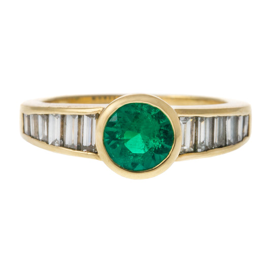 An Emerald & Diamond Ring in 18K