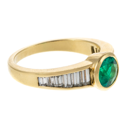 An Emerald & Diamond Ring in 18K