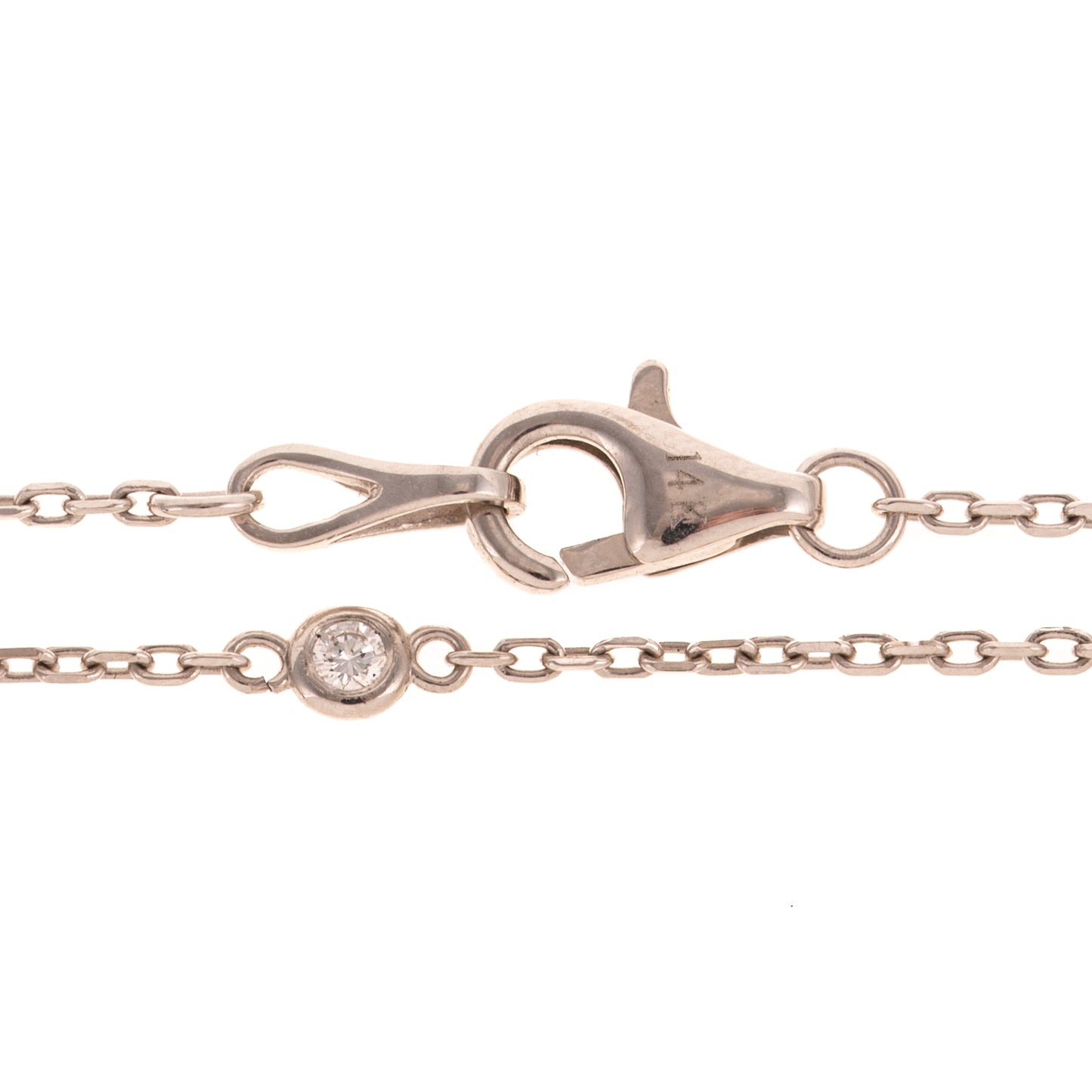 A 0.80 ct Diamond Pendant & Station Necklace in 18K