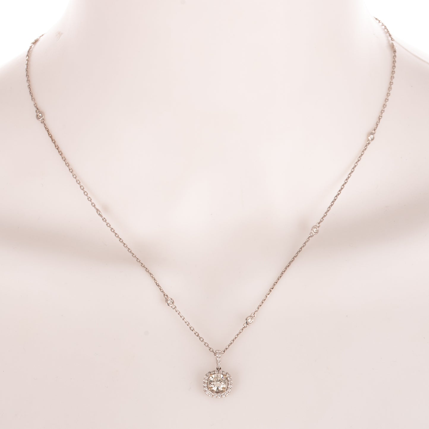 A 0.80 ct Diamond Pendant & Station Necklace in 18K