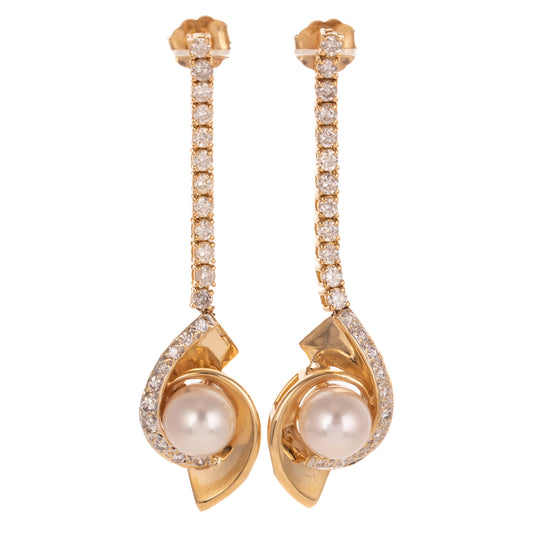 A Pair of Pearl & Diamond Dangle Earrings in 14K
