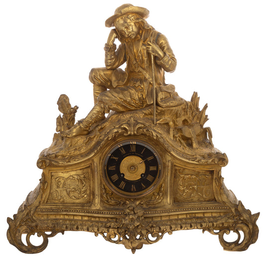 A French Gilt Bronze Figural Mantel Clock