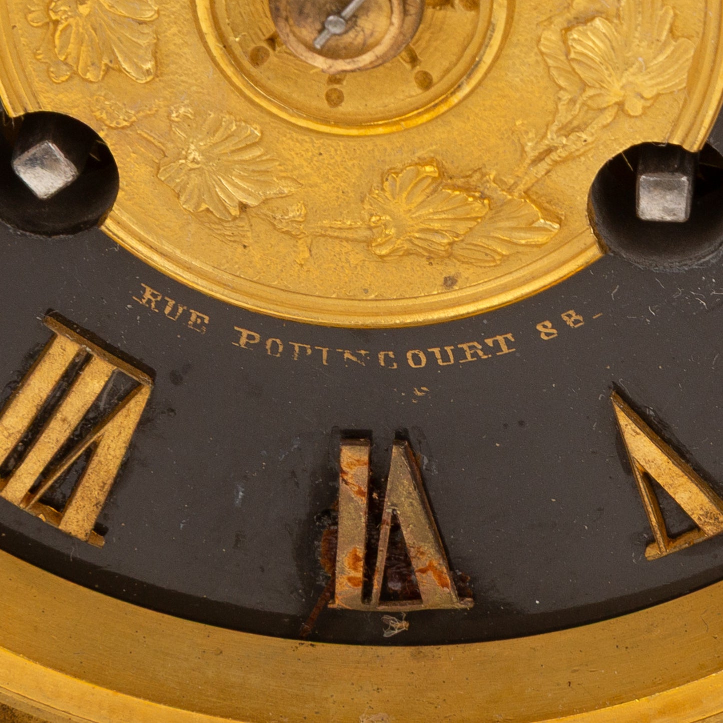 A French Gilt Bronze Figural Mantel Clock