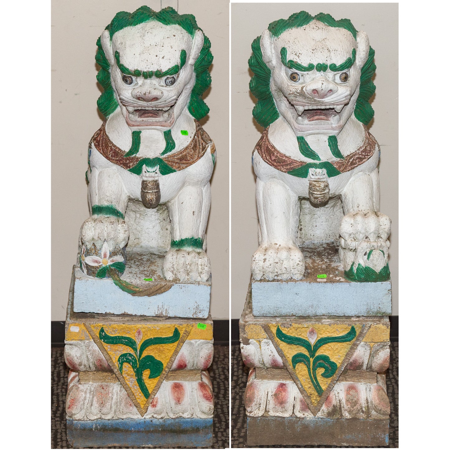 A Large Pair of Painted Stone Foo Dogs