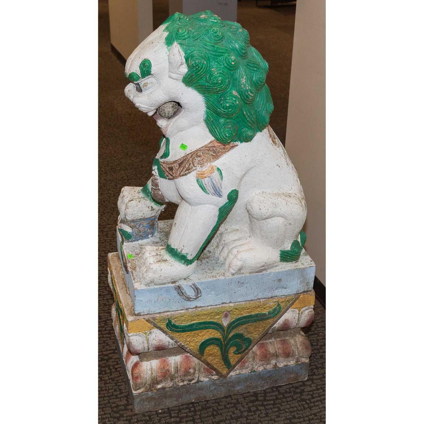 A Large Pair of Painted Stone Foo Dogs