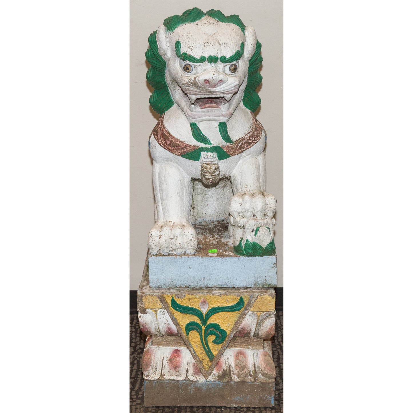 A Large Pair of Painted Stone Foo Dogs