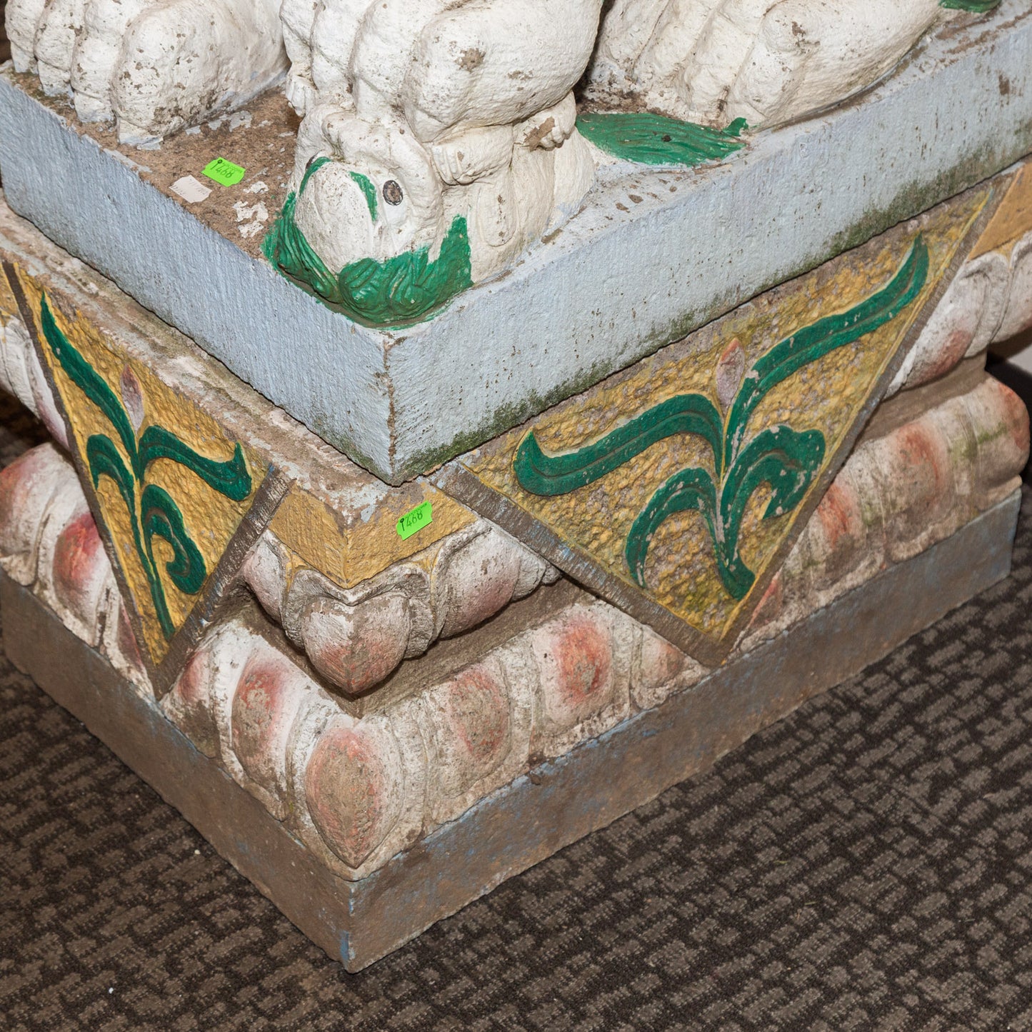 A Large Pair of Painted Stone Foo Dogs