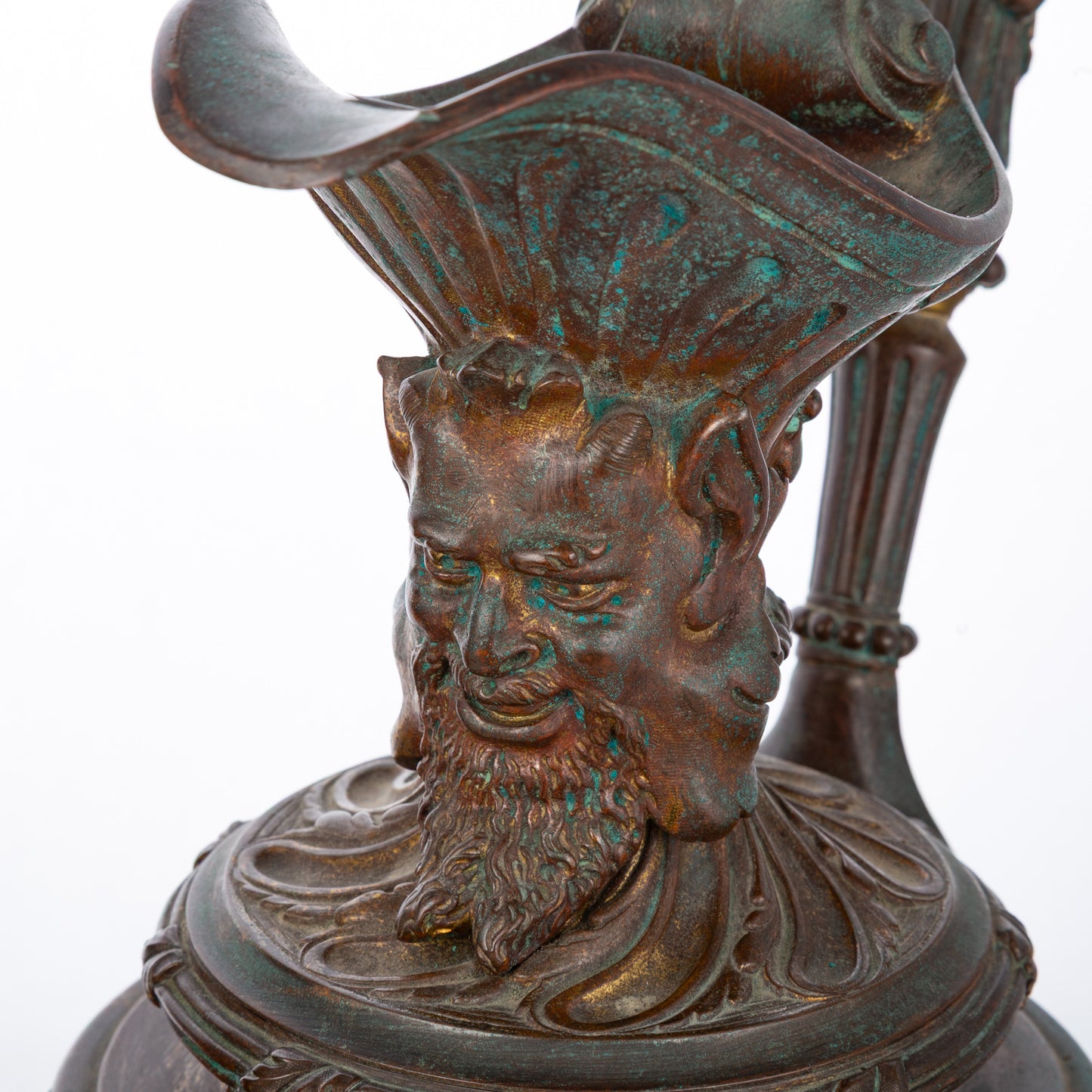 A Pair of Putti & Satyr Footed Ewers