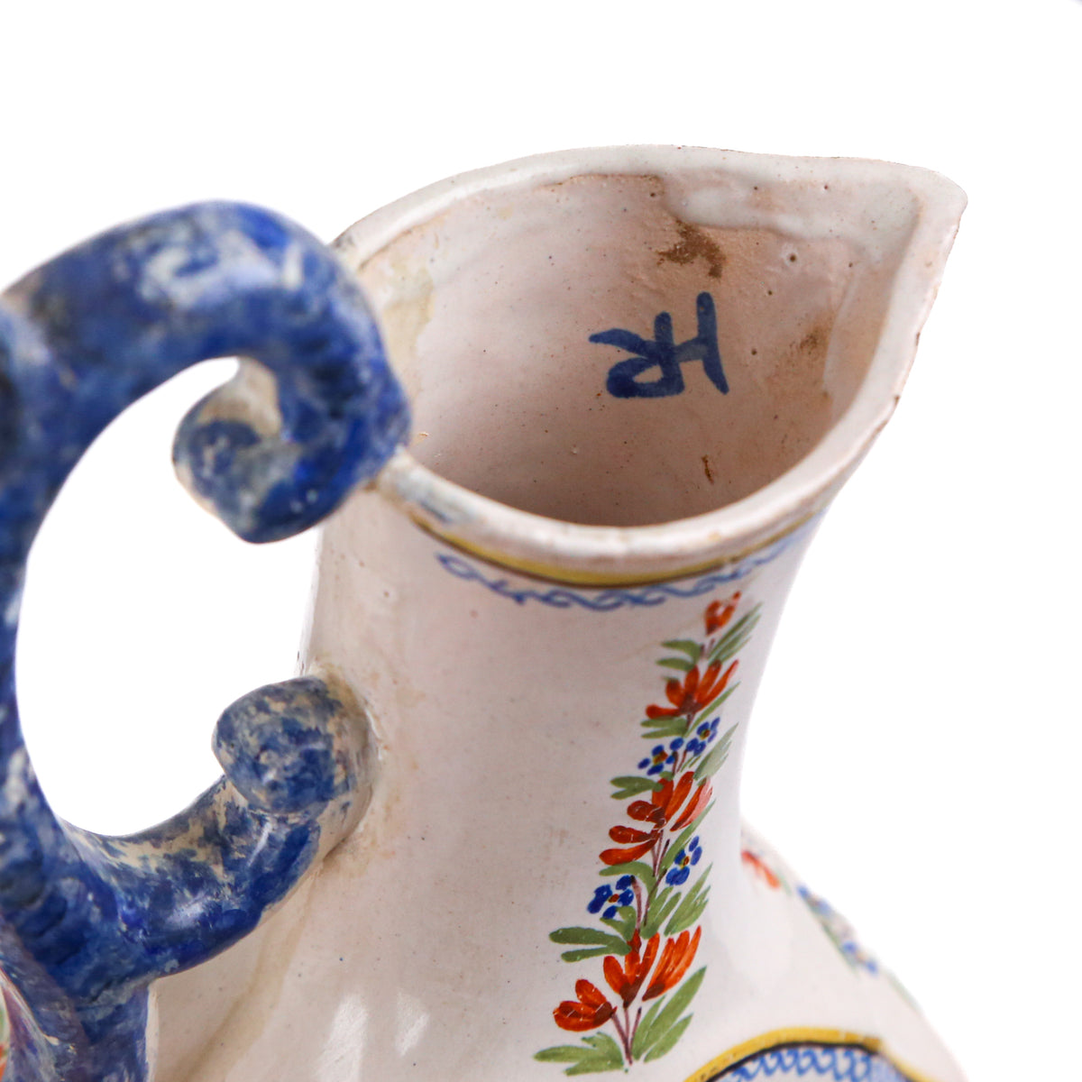 A Pair of Henriot Quimper Ewers