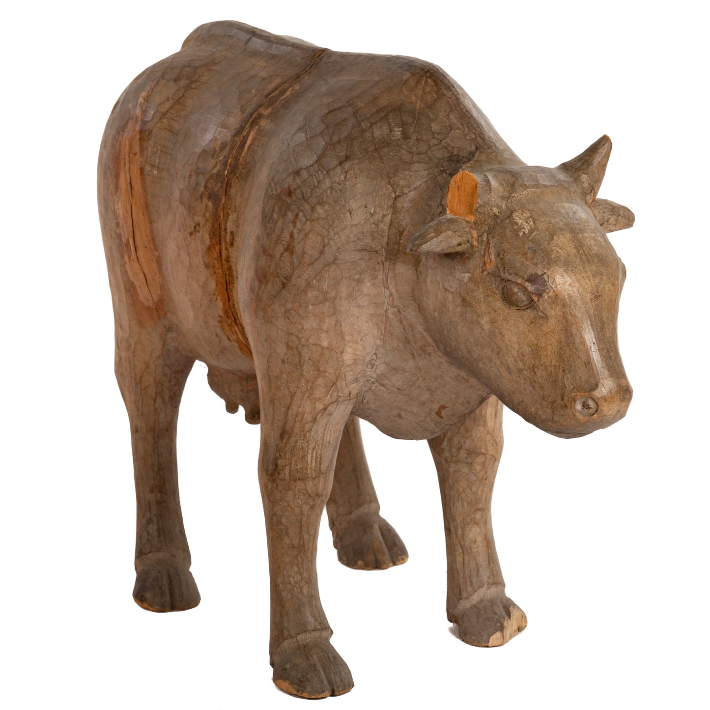 A Hand-Carved Wooden Cow