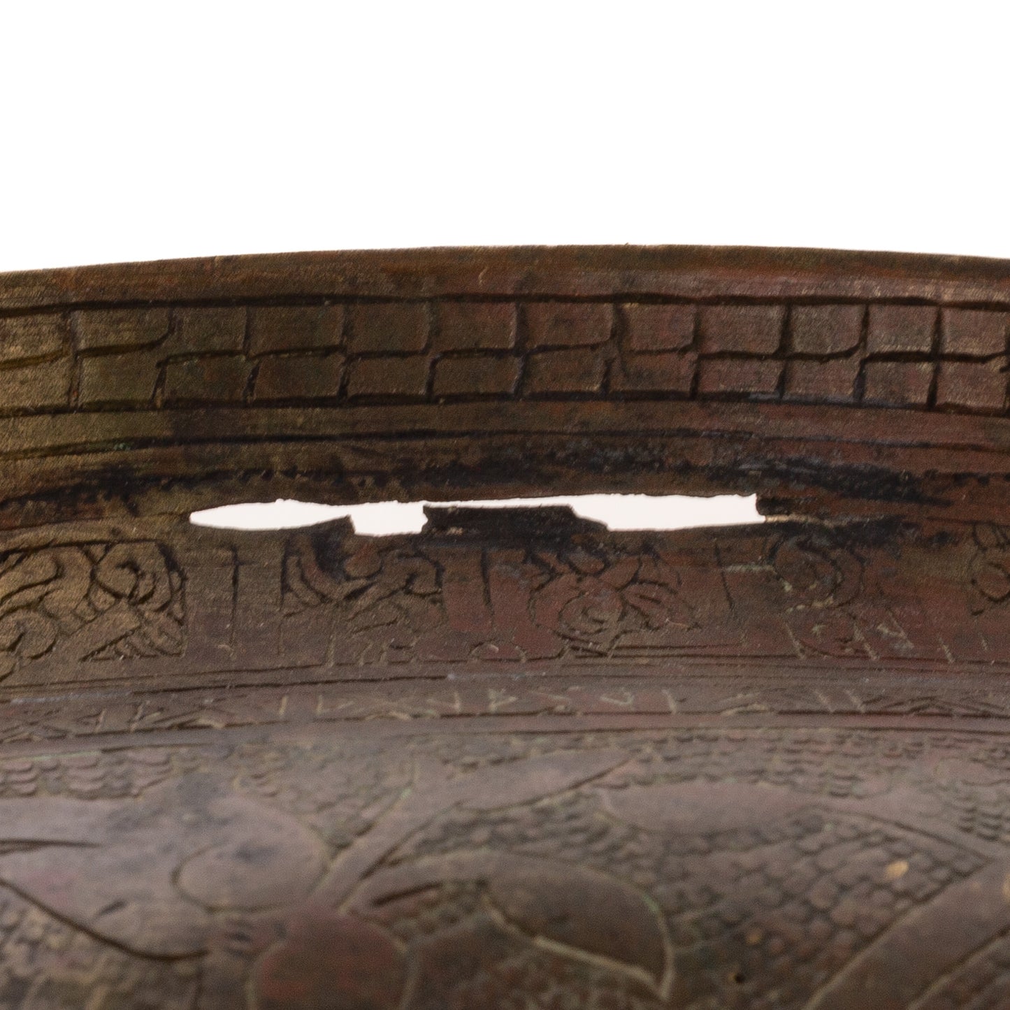A Bronze Peruvian Etched Vessel