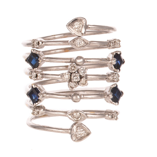 A Diamond & Sapphire Spiral Ring in 18K