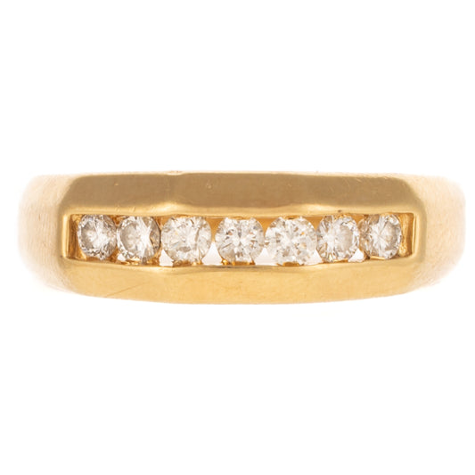 A 0.60 ctw Diamond Channel Set Band in 14K