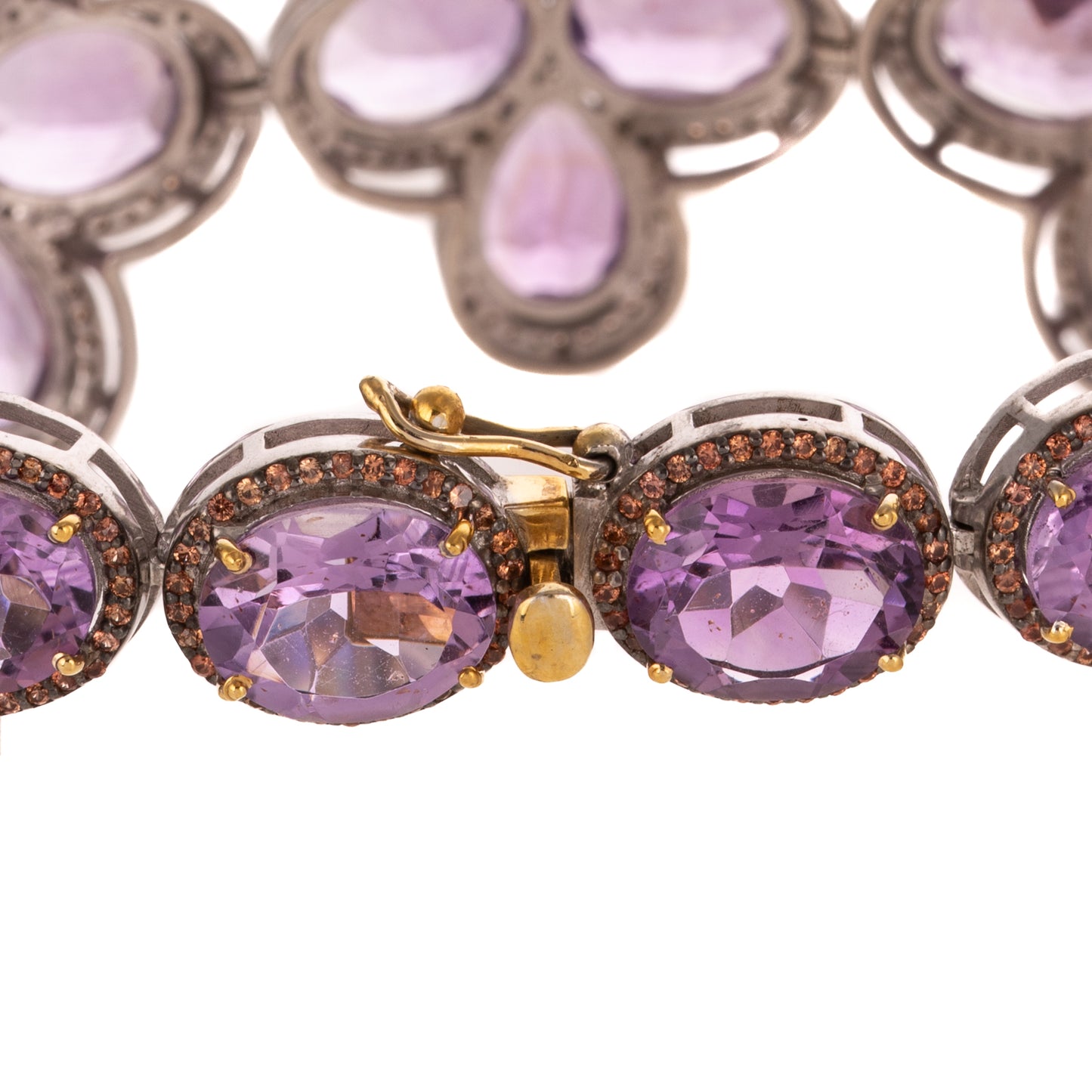 A Decorative Amethyst & Orange Sapphire Bracelet in Sterling Silver