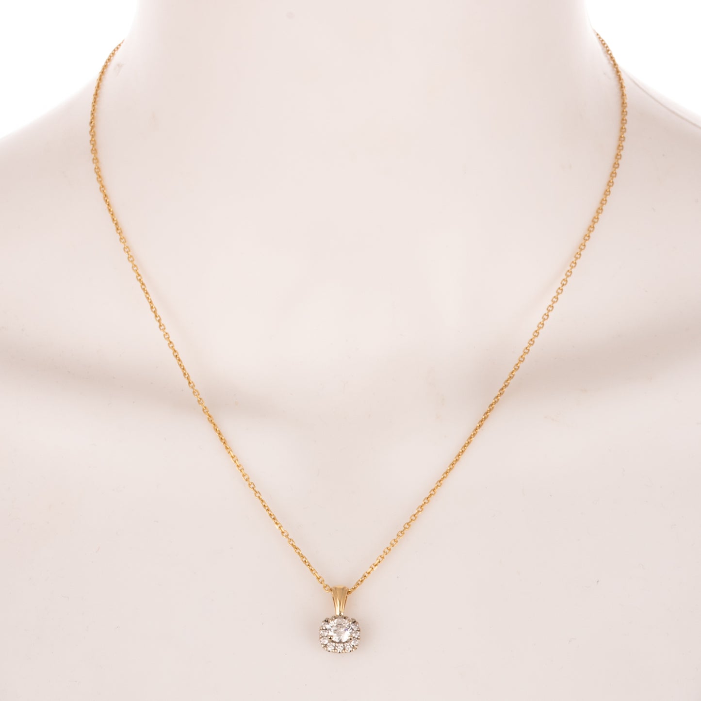 A 0.90 ctw Diamond Pendant in 14K