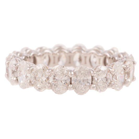 A 3.90 ctw Oval Diamond Eternity Band in 18K