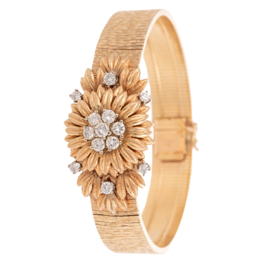 A Covered Floral Diamond Wrist Watch in 14K