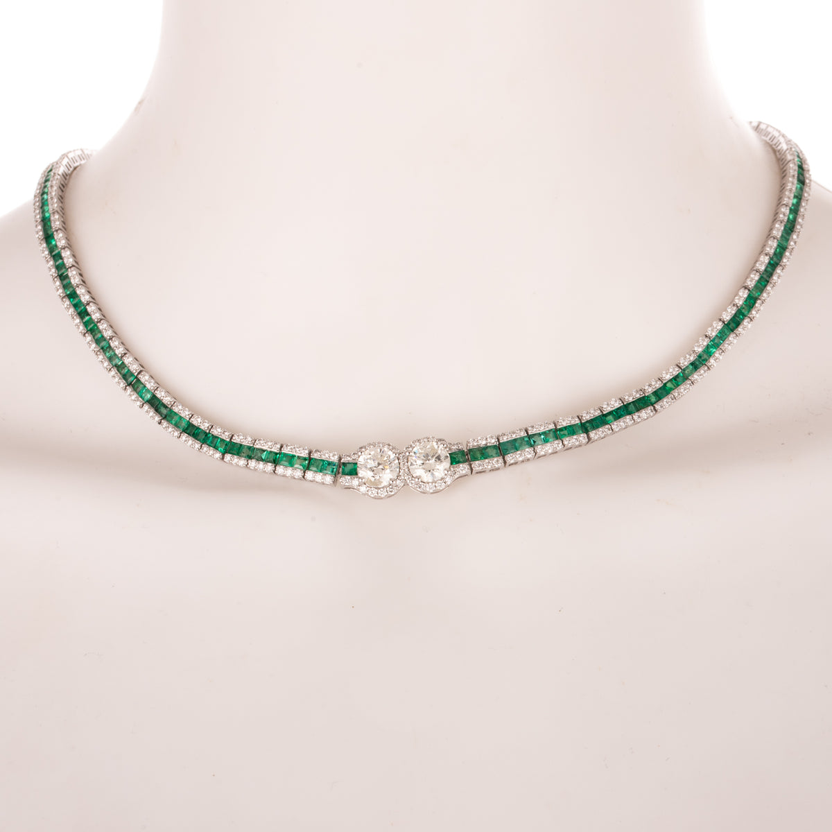 An Important Diamond & Emerald Line Necklace in Platinum