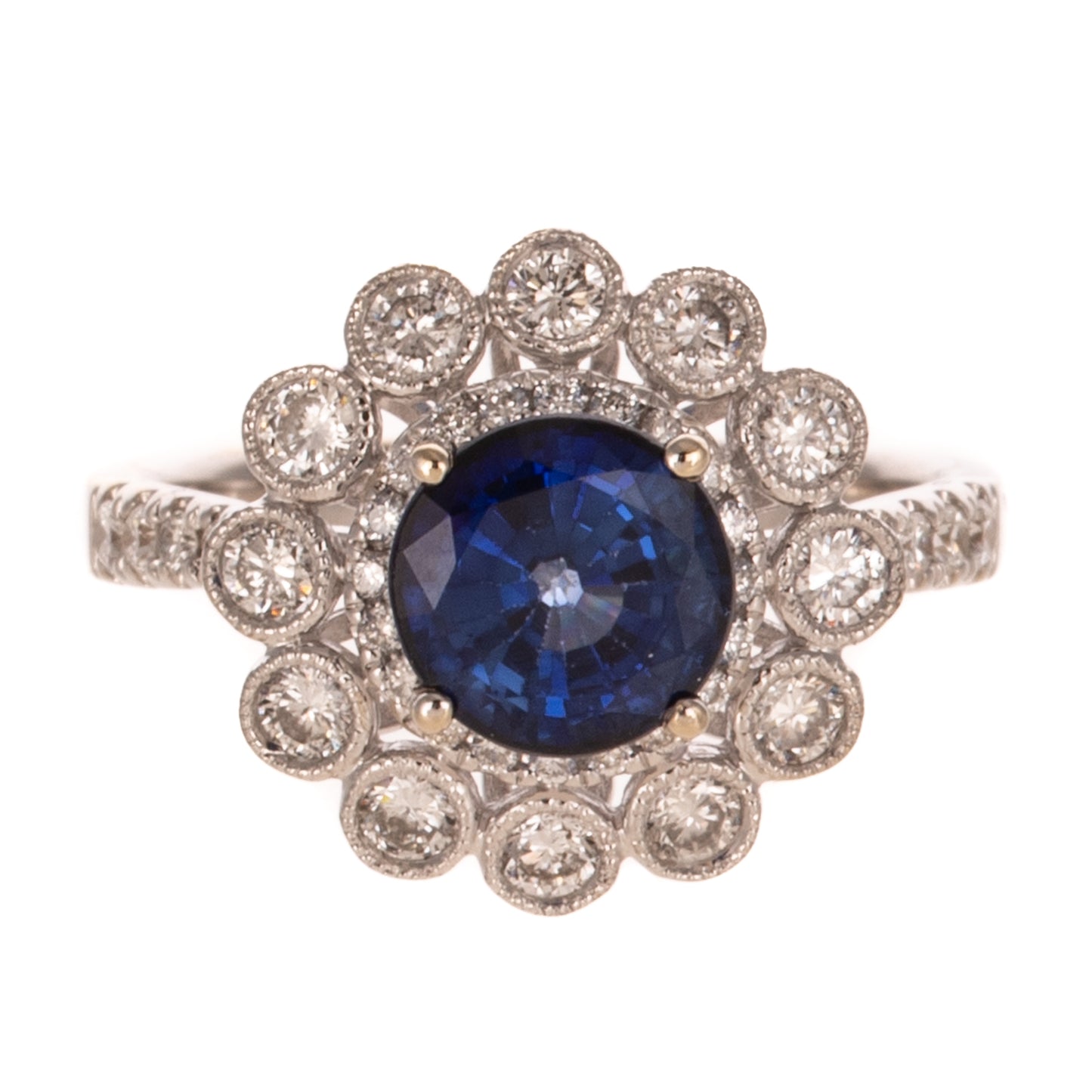 A Sapphire & Diamond Flower Ring in 18K