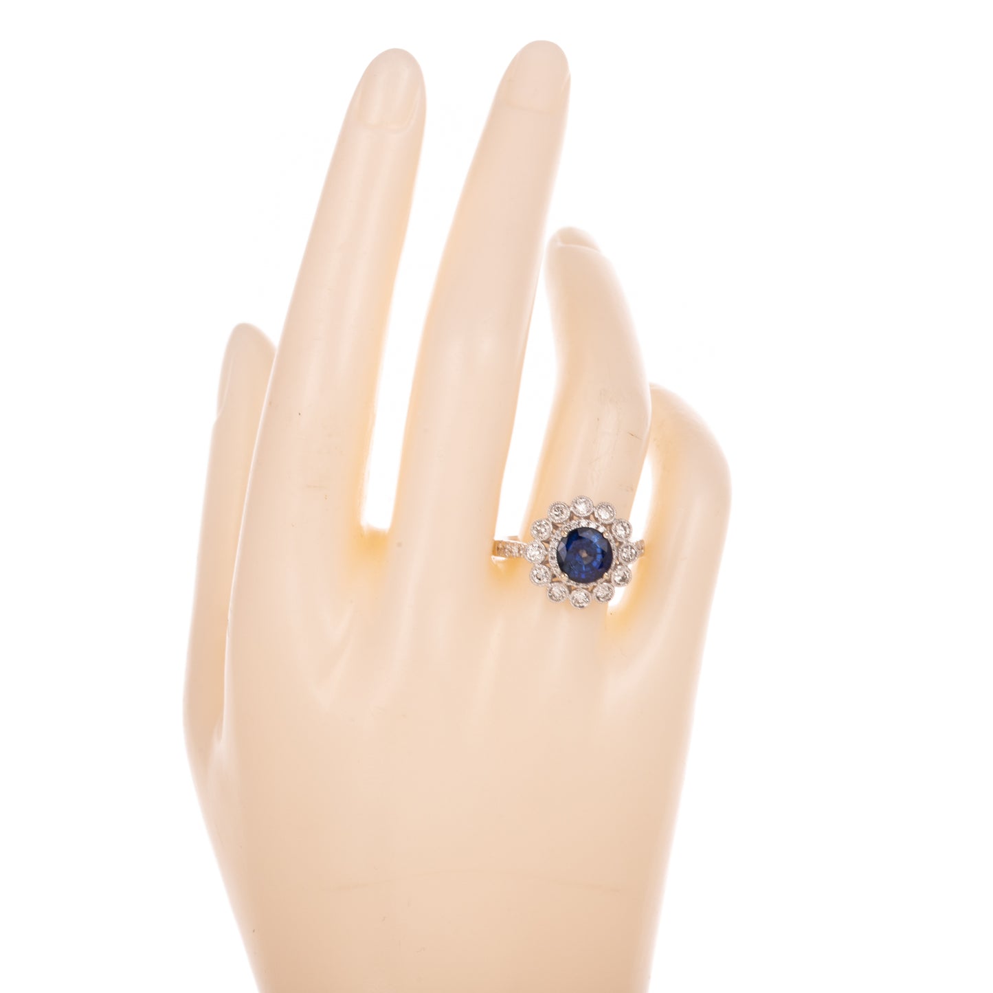 A Sapphire & Diamond Flower Ring in 18K