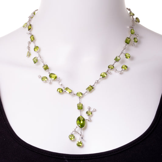 An Abstract Peridot & Diamond Set in 18K