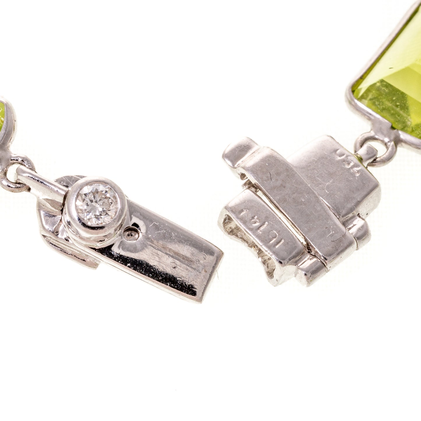 An Abstract Peridot & Diamond Set in 18K